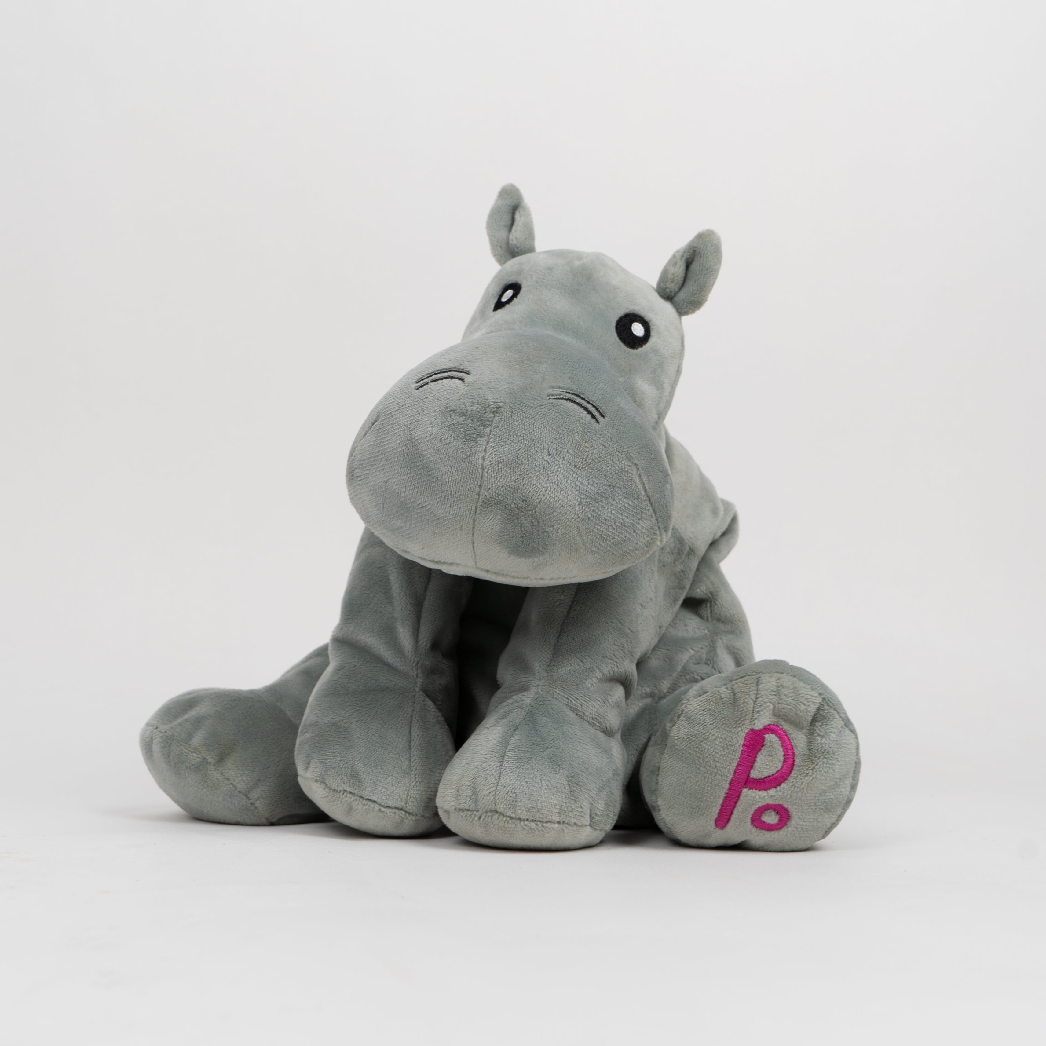 Gray plush hippo toy with a pink 'PO' on a white background