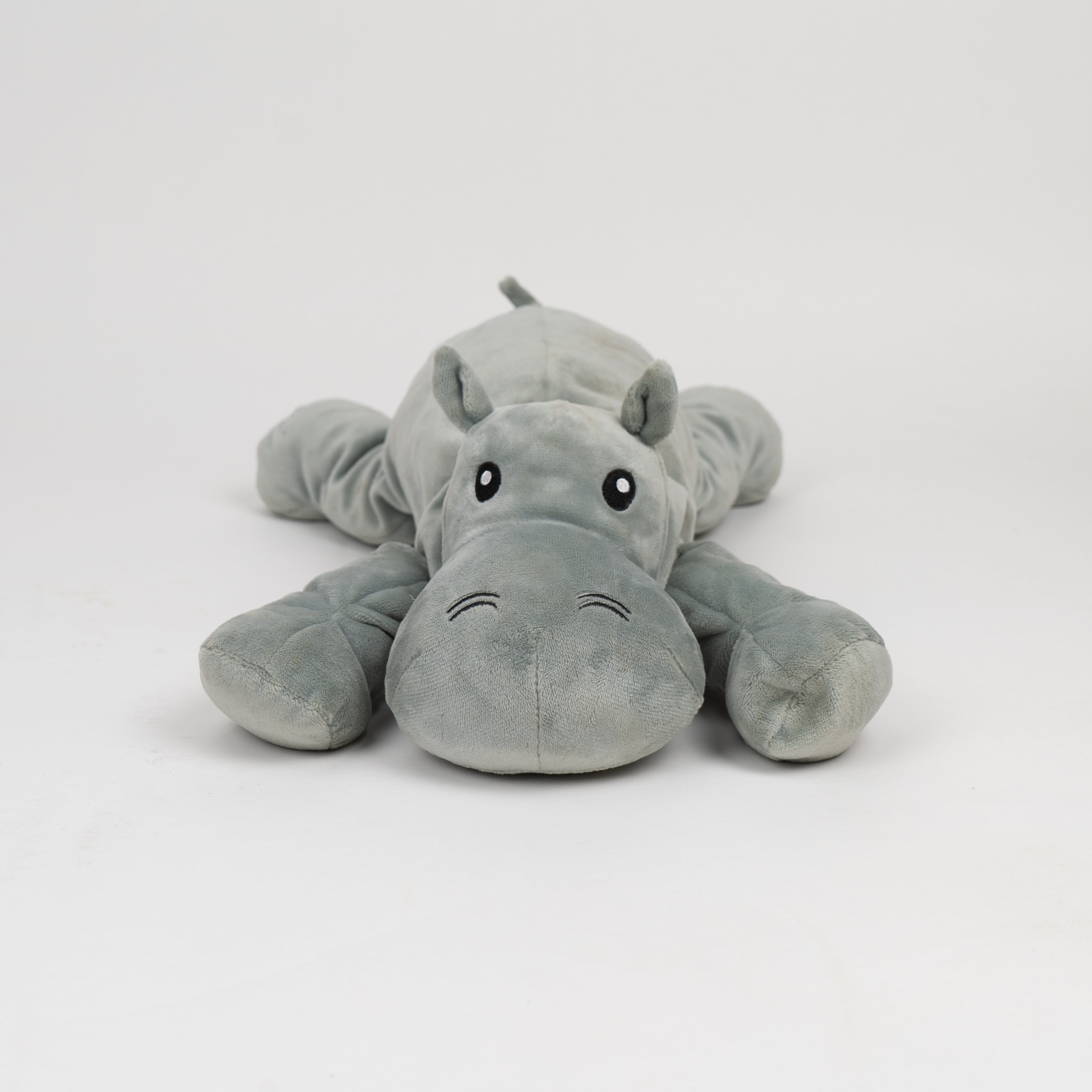 Gray hippo plush toy on a white background