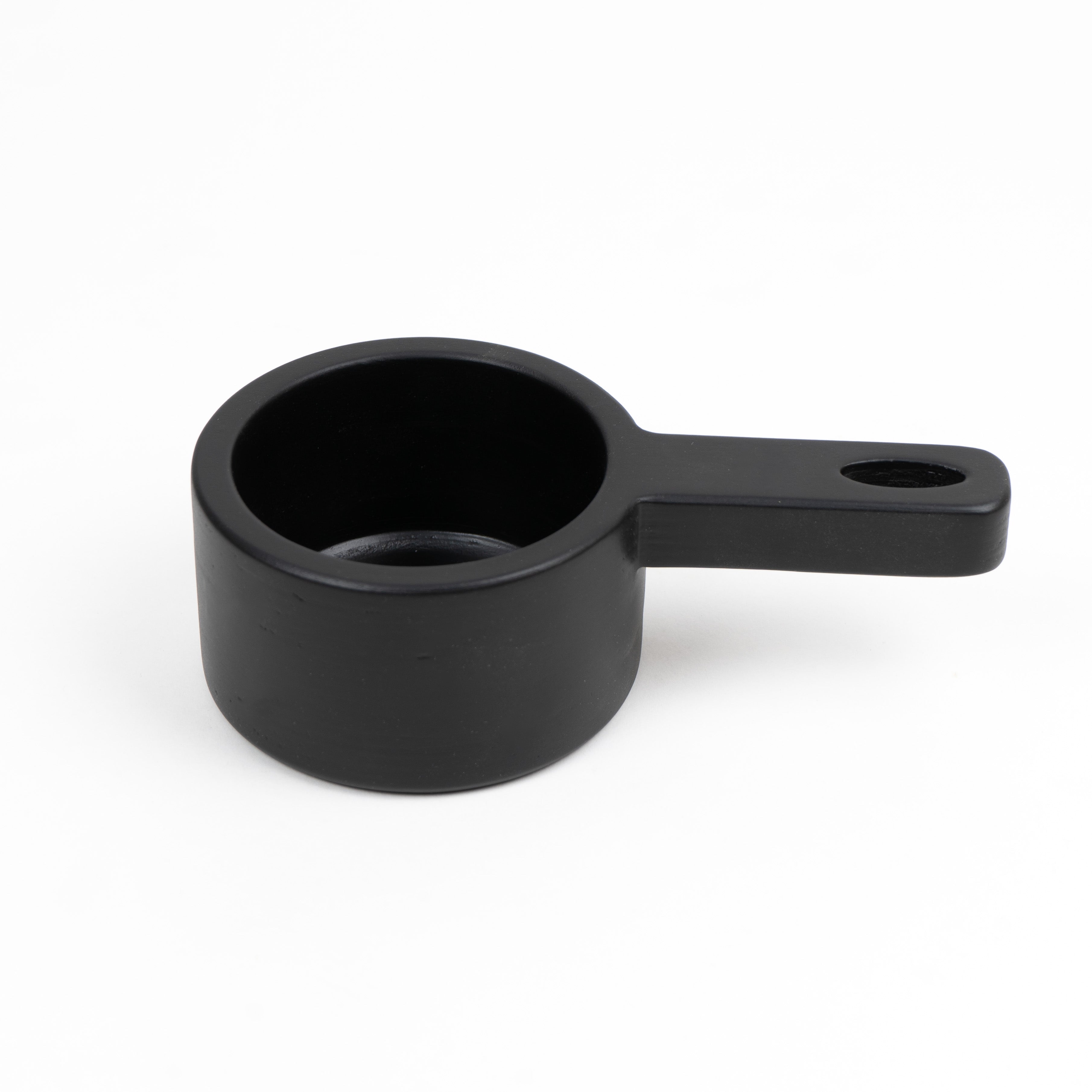 Black wooden kids pan on a white background