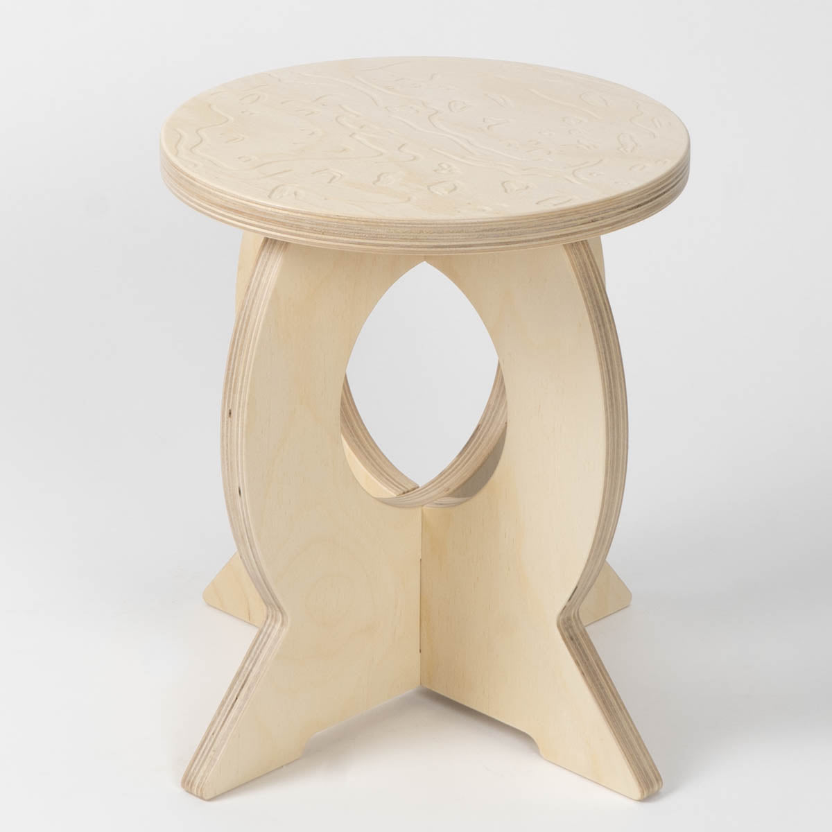 Wooden stool with Mars etched design on a white background